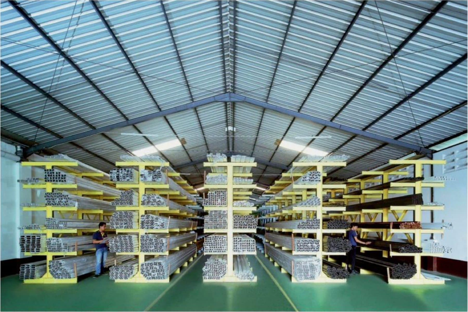 An extensive stock of aluminium, organised for precision fabrication. It is here that our standards are set.